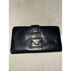 black leather michael kors wallet With silver buckle￼used